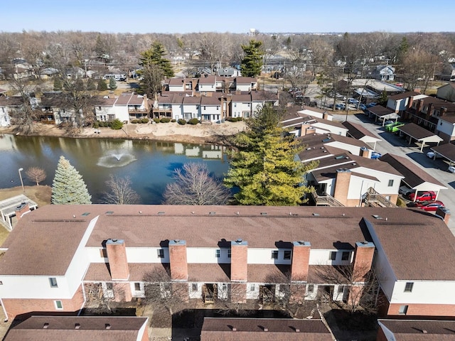 aerial view featuring a residential view and a water view