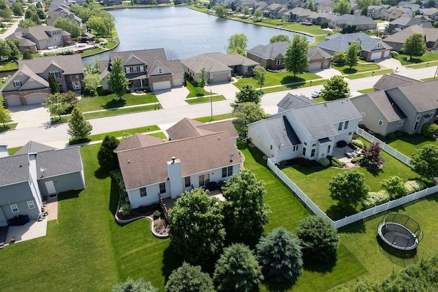 bird's eye view with a residential view and a water view