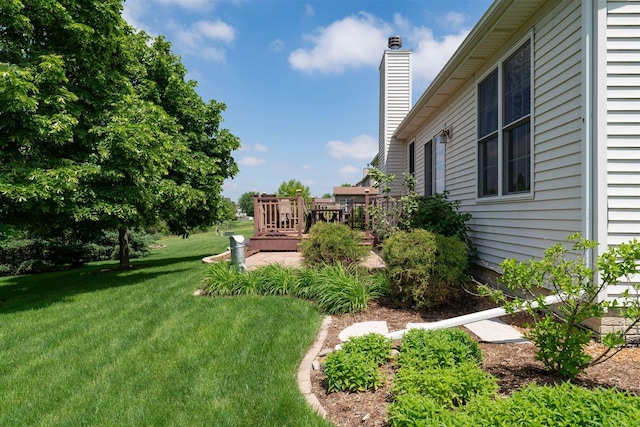 view of yard featuring a deck