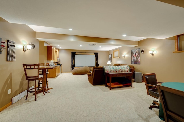 bedroom featuring light carpet, recessed lighting, and baseboards