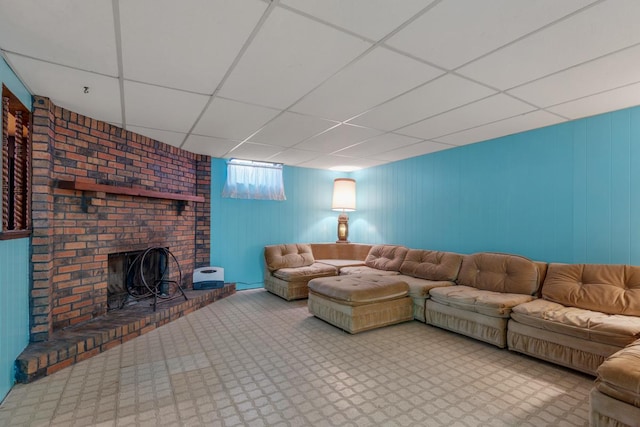 unfurnished living room with a paneled ceiling