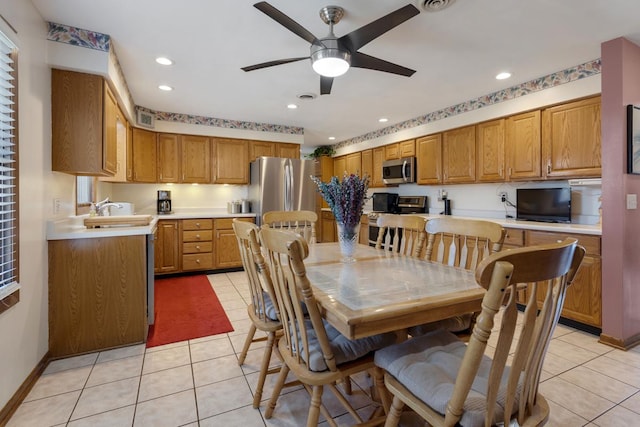 dining room featuring light tile patterned floors, baseboards, recessed lighting, and a ceiling fan