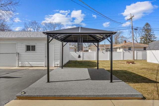 view of patio / terrace with a gazebo and fence