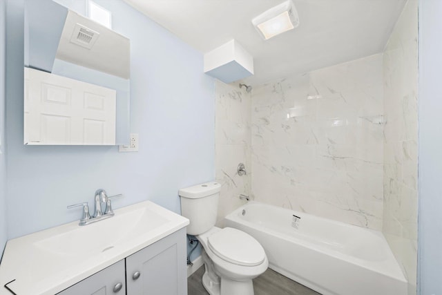 full bathroom featuring visible vents, toilet, vanity, and shower / bathing tub combination