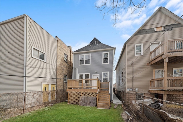 back of house featuring a fenced backyard, a wooden deck, stairs, and a yard