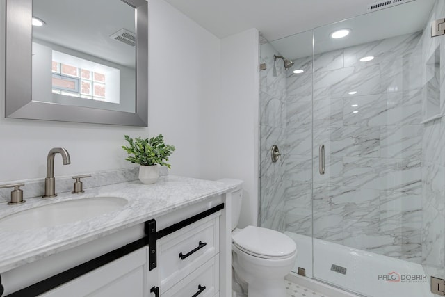 bathroom with a marble finish shower, visible vents, toilet, recessed lighting, and vanity