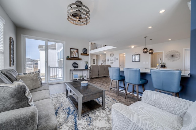 living area featuring recessed lighting and wood finished floors