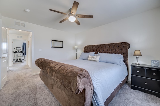 bedroom featuring visible vents, carpet flooring, baseboards, and ceiling fan