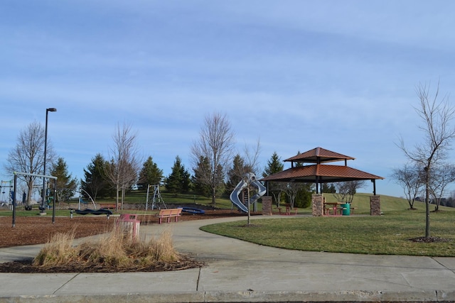 view of home's community with a gazebo, a yard, and playground community