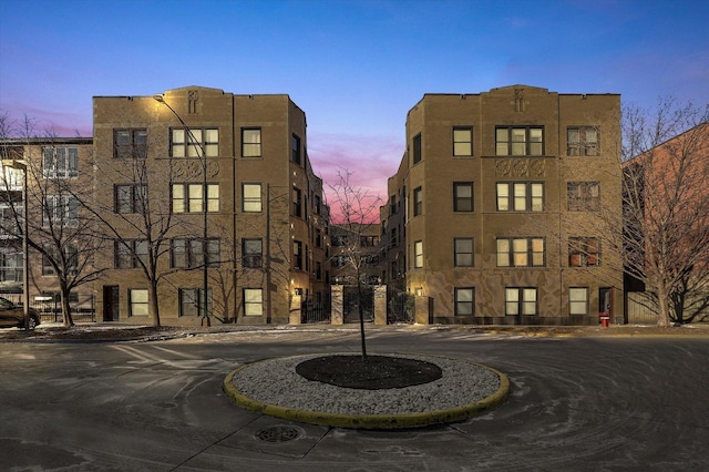 view of property at dusk