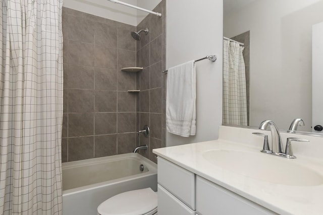 bathroom featuring vanity, toilet, and shower / bath combo