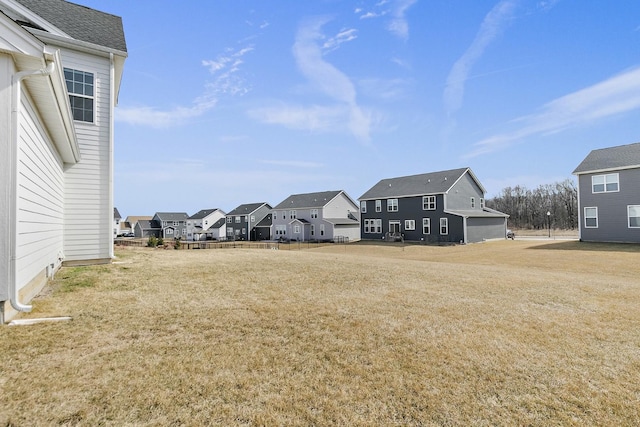 view of yard with a residential view