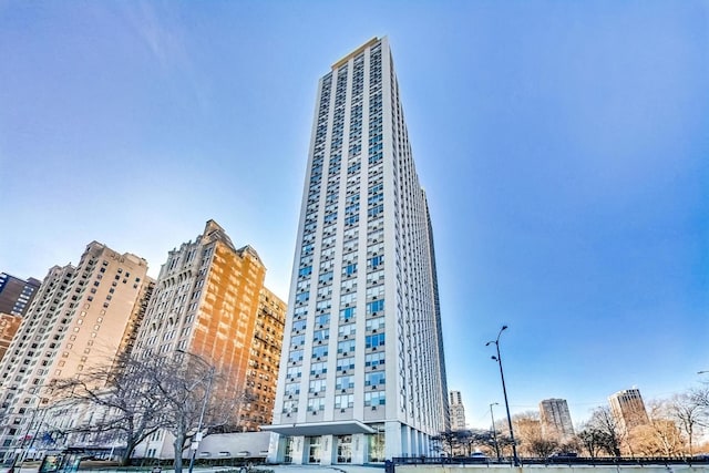 view of building exterior featuring a city view