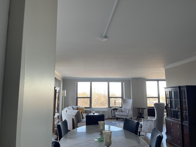 dining room with crown molding