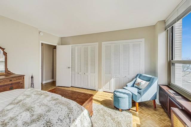 bedroom with multiple closets