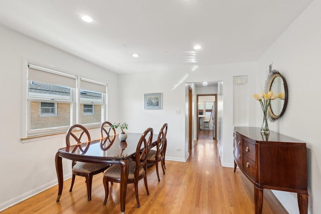 dining space with recessed lighting, baseboards, and light wood-style floors