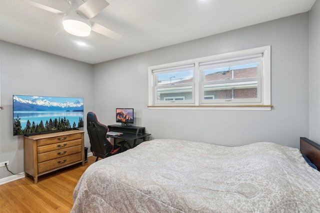 bedroom featuring ceiling fan and wood finished floors