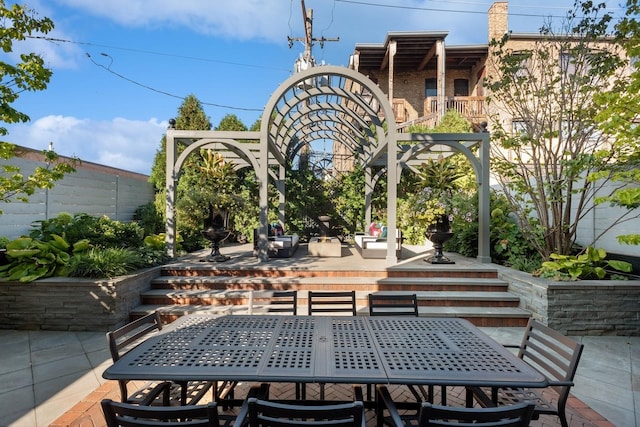 view of patio featuring outdoor dining area