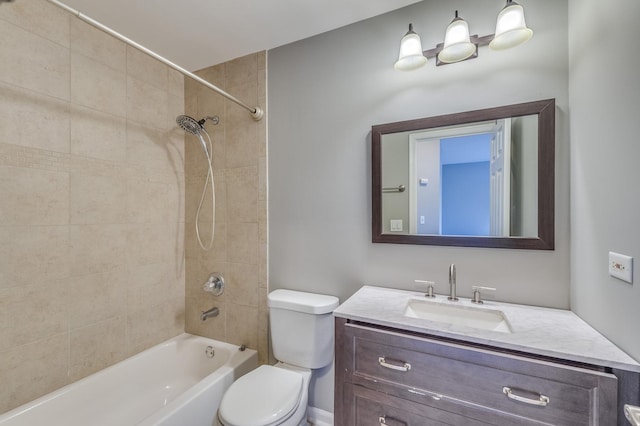 full bathroom featuring toilet, vanity, and bathing tub / shower combination