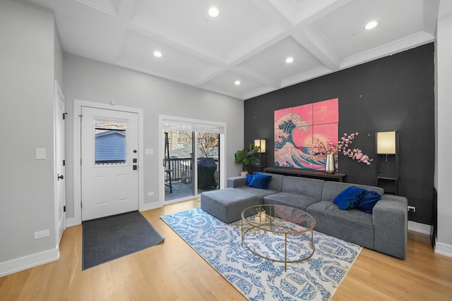 living room with light wood-type flooring, baseboards, coffered ceiling, and beam ceiling