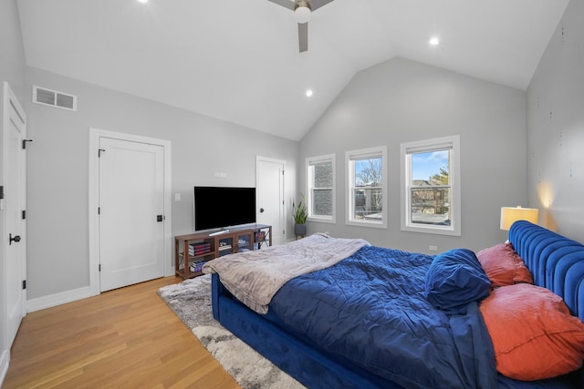 bedroom featuring visible vents, high vaulted ceiling, recessed lighting, ceiling fan, and light wood-style floors