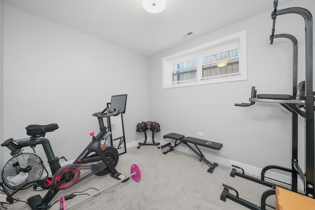 workout room with visible vents, baseboards, and carpet floors