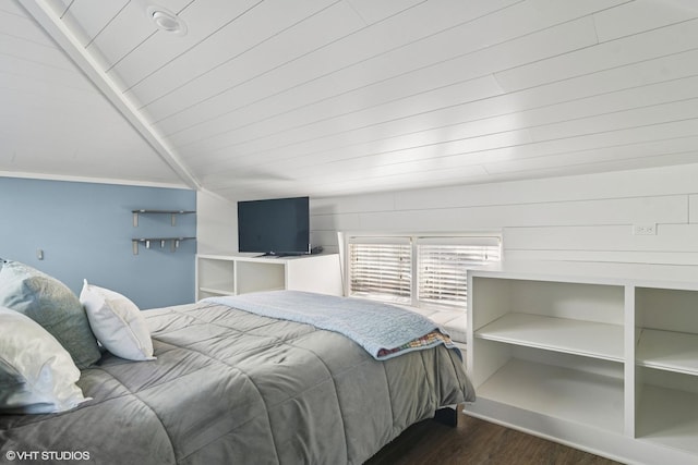 bedroom featuring dark wood-style flooring