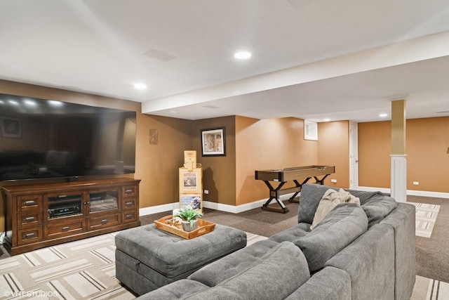 carpeted living room with recessed lighting and baseboards