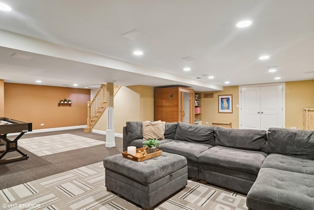 living room featuring light colored carpet, stairway, recessed lighting, and baseboards