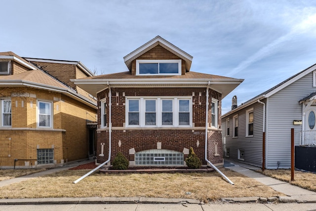 view of front of property featuring brick siding