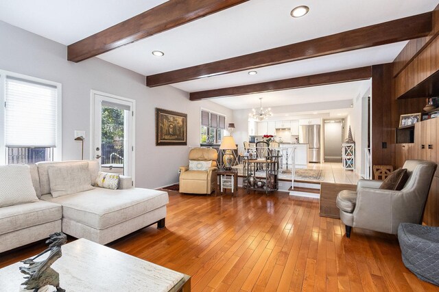 1424 Mason Ave, Joliet, IL 60435 - living room featuring a chandelier, beamed ceiling, light wood finished floors, and recessed lighting