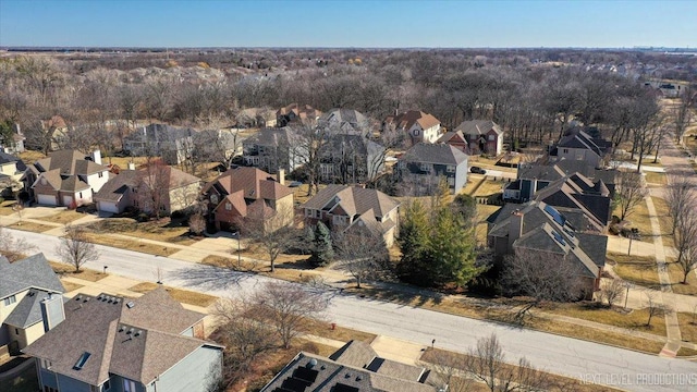 birds eye view of property with a residential view