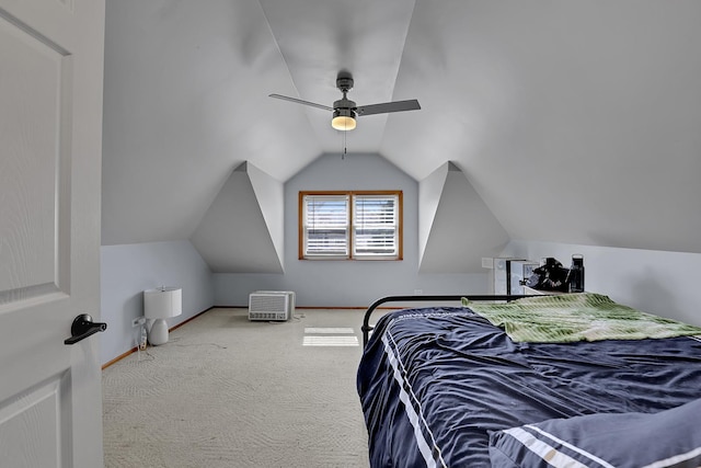 carpeted bedroom featuring baseboards, a ceiling fan, and vaulted ceiling