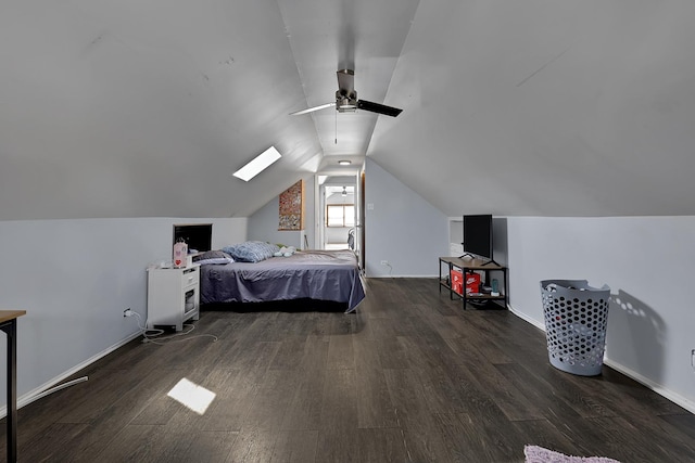 bedroom with baseboards, lofted ceiling, wood finished floors, and a ceiling fan