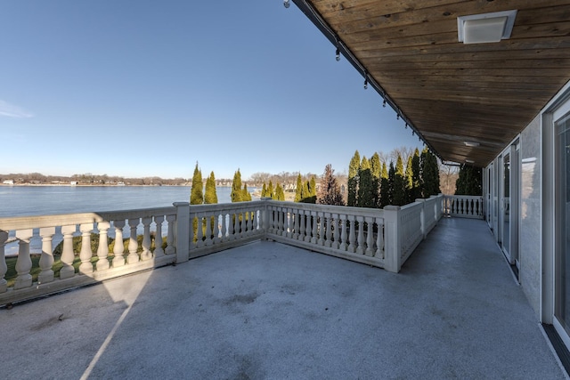 view of patio / terrace featuring a water view