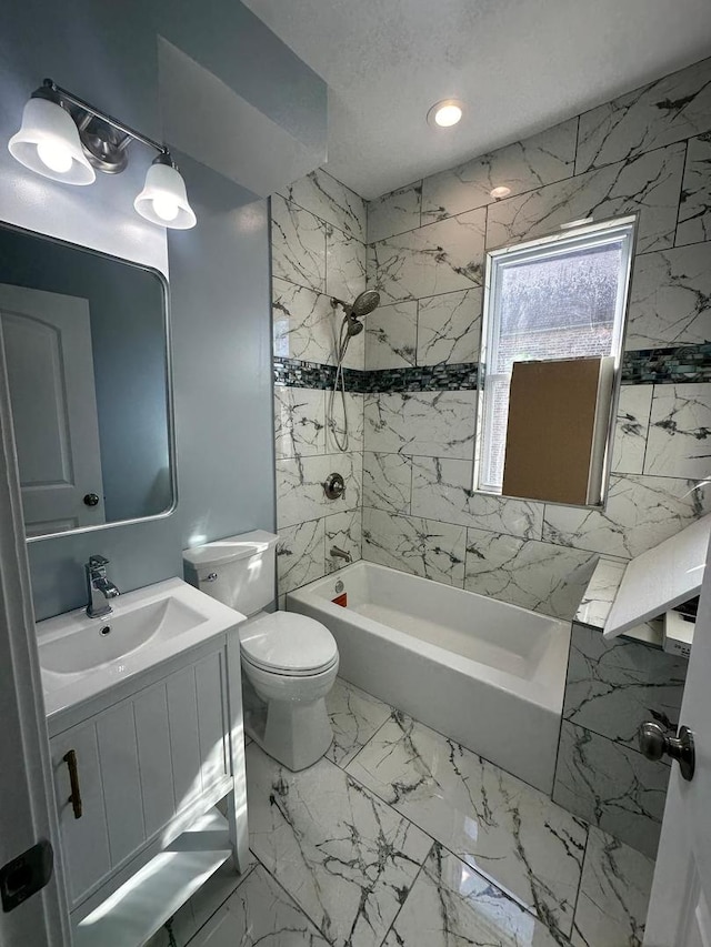 full bathroom with tub / shower combination, toilet, marble finish floor, a textured ceiling, and vanity