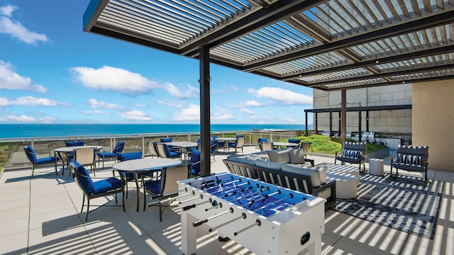 view of patio with outdoor dining space, a pergola, a water view, and an outdoor hangout area