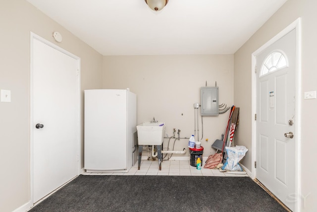 interior space featuring electric panel and tile patterned floors