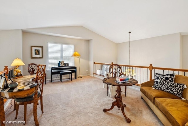 living area featuring lofted ceiling, carpet, and baseboards