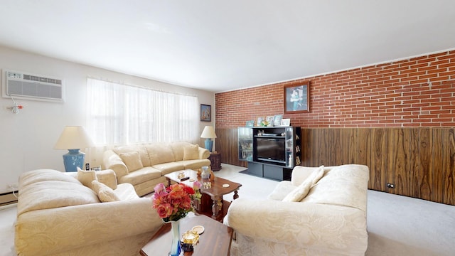 living room with an AC wall unit, light colored carpet, and brick wall