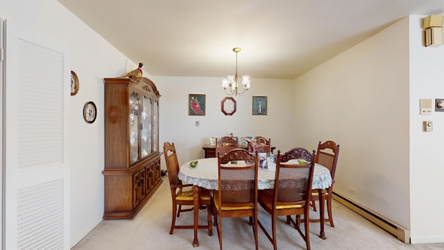 dining space featuring an inviting chandelier, light carpet, baseboards, and a baseboard radiator