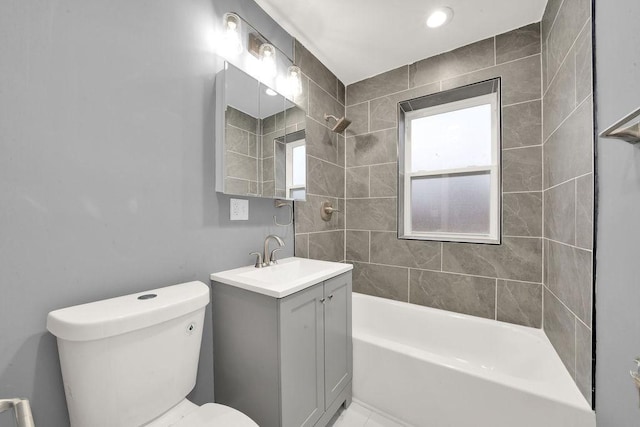 full bathroom with toilet,  shower combination, and vanity