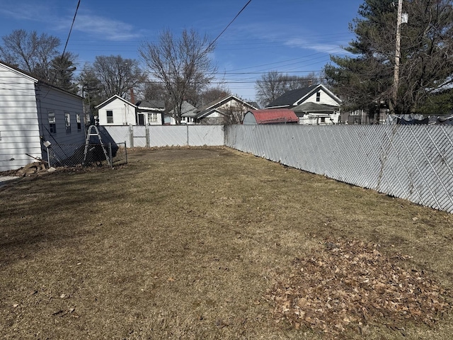 view of yard featuring a fenced backyard