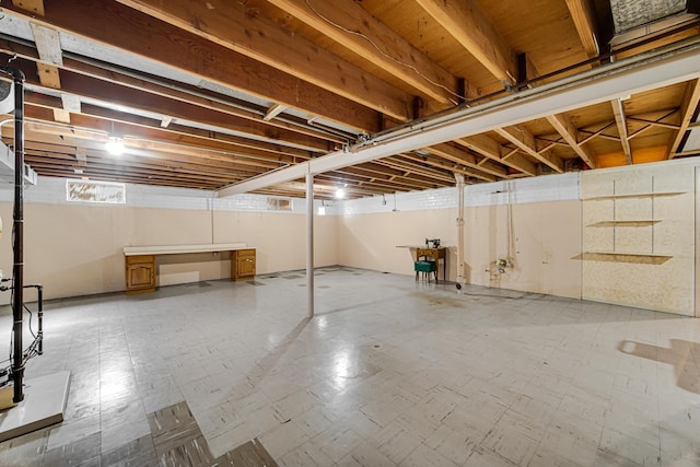 basement featuring tile patterned floors