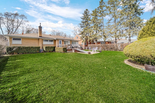 view of yard with a patio and fence