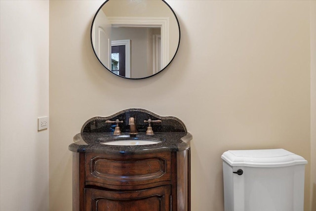 half bathroom with vanity