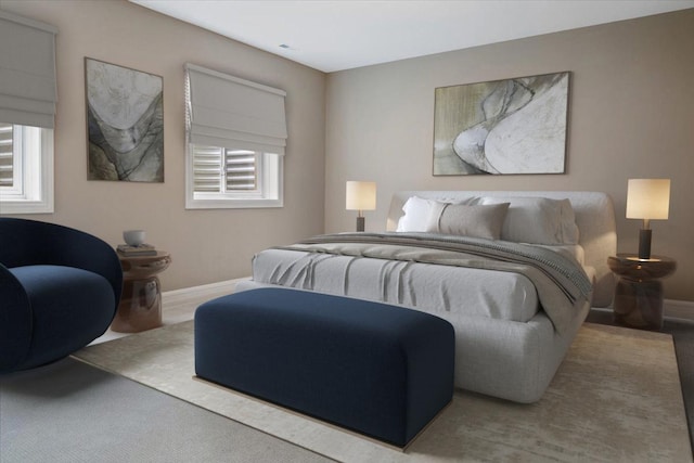 bedroom with carpet and baseboards