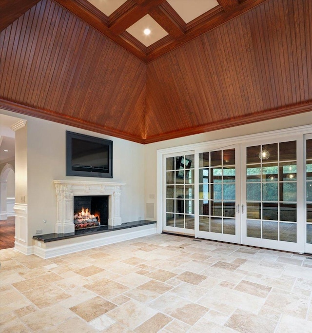 view of patio / terrace with french doors and a high end fireplace