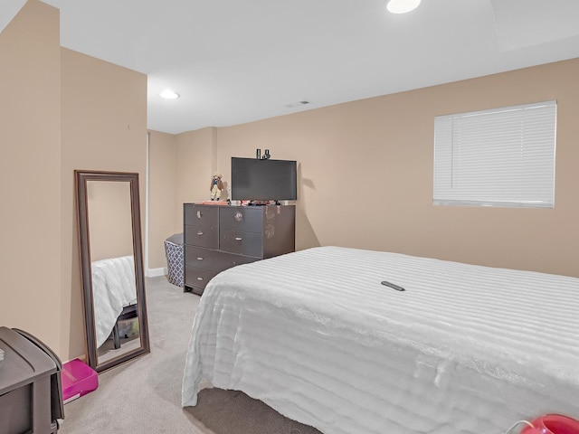 bedroom with visible vents, recessed lighting, and carpet