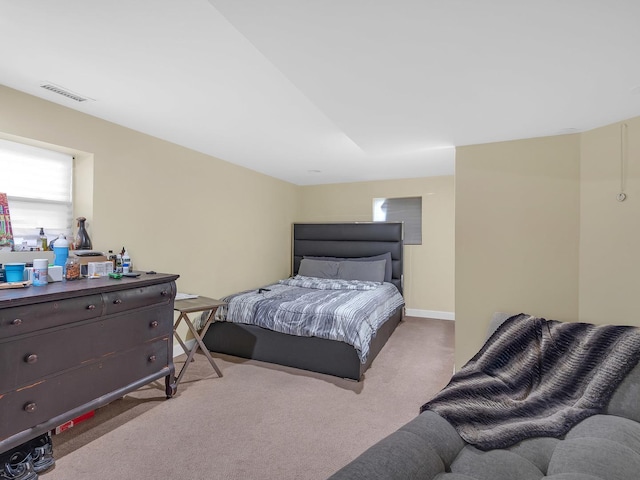 bedroom featuring carpet flooring, baseboards, and visible vents